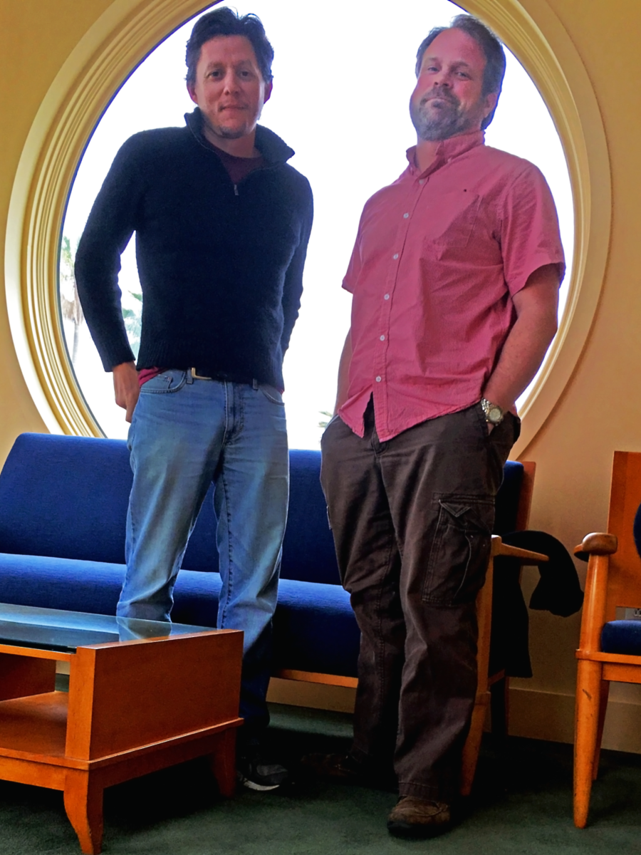 James Dent and Joel Walker standing together in the Tower Room at Kohn Hall